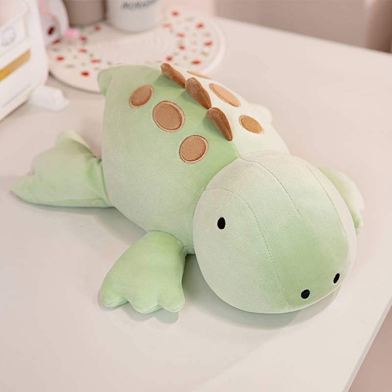 Sensorisches Dino Kuscheltier für Kinder mit ADHS oder Autismus – fördert Entspannung und Achtsamkeit.